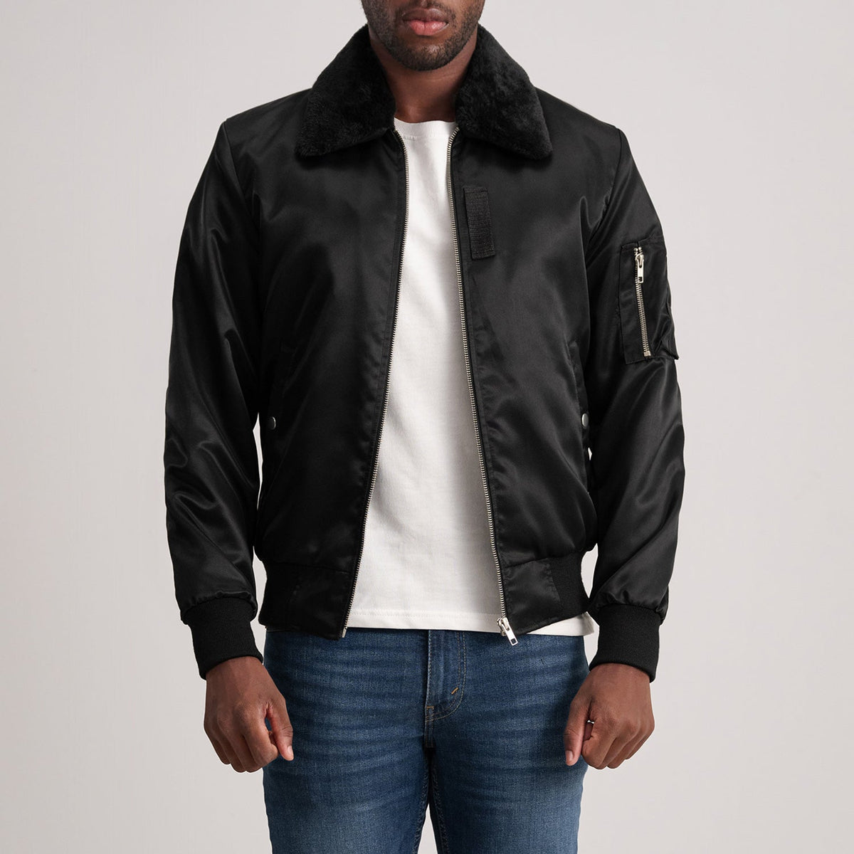 Close-Up Detail of Removable faux fur collar &amp; Zipper Hardware on Clyde B-15 Black Bomber Jacket