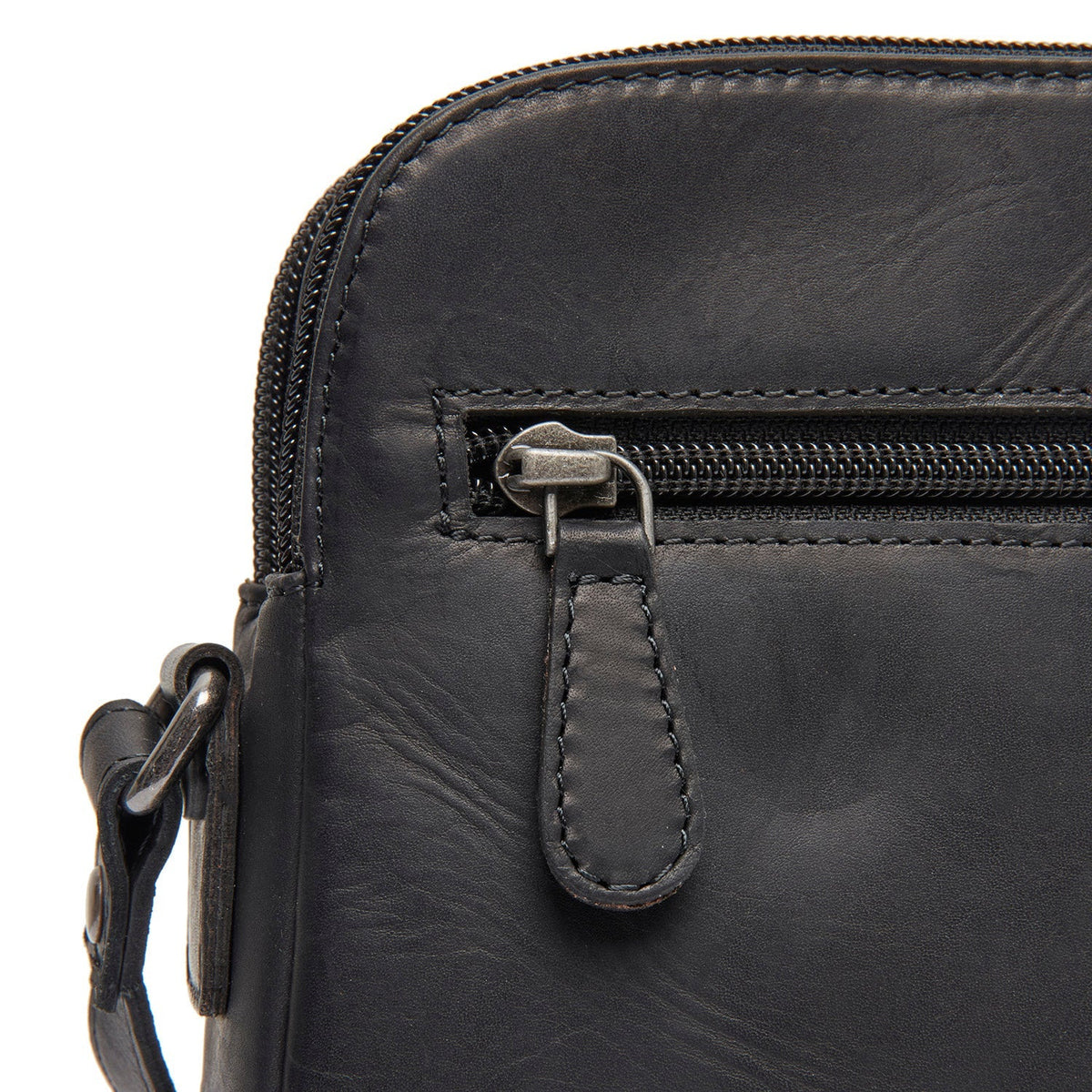 
Vionne Kožená crossbody taška - Strukturovaný boční profil ukazující hloubku a kapacitu