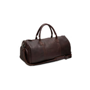 
Fotografie na postavě:  Leather Garment Bag Finlay na modelovi v přirozeném denním světle