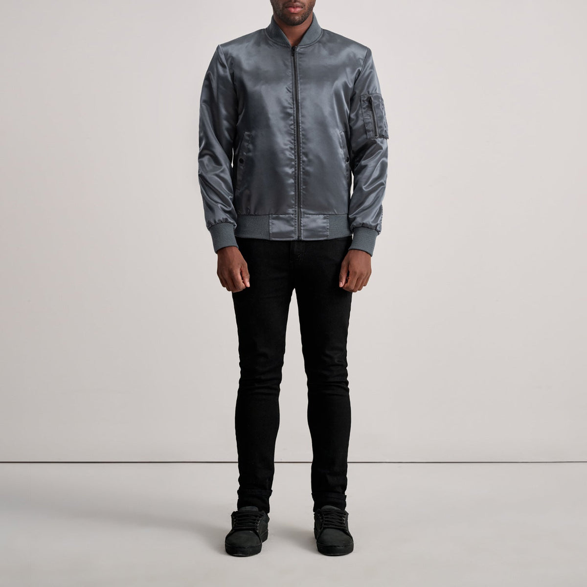 Close-Up Detail of Varsity &amp; Zipper Hardware on Quinton MA-1 Grey Bomber Jacket