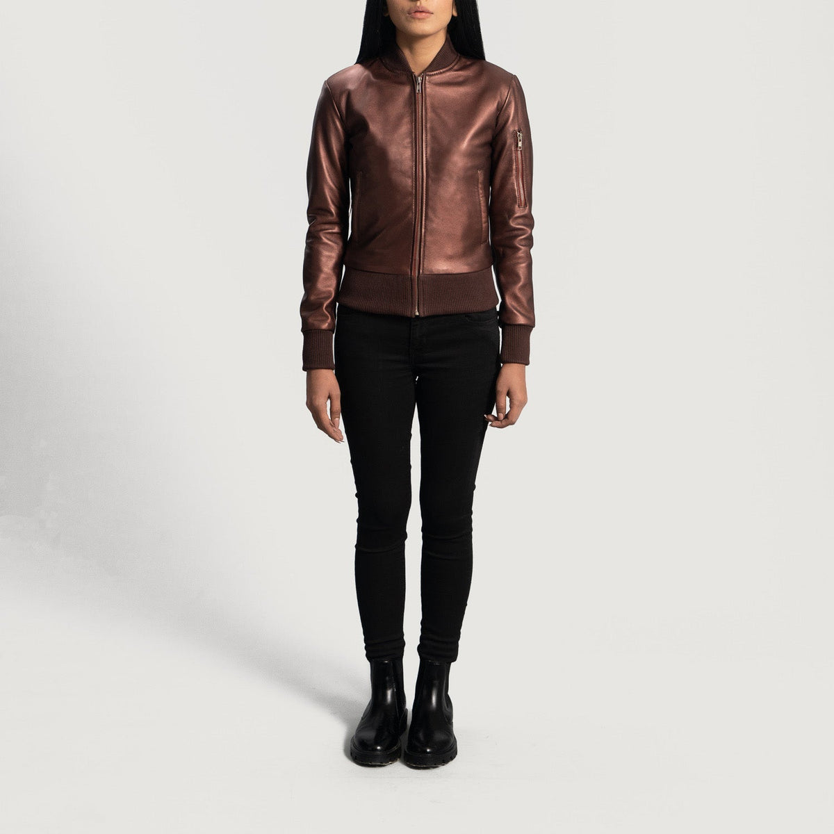 Close-Up Detail of Varsity &amp; Zipper Hardware on Women's Reida Maroon Leather Bomber Jacket